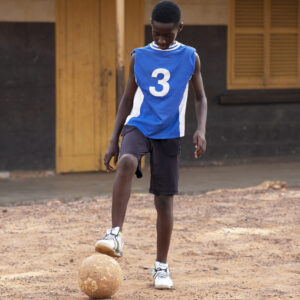 full-shot-kid-playing-with-ball